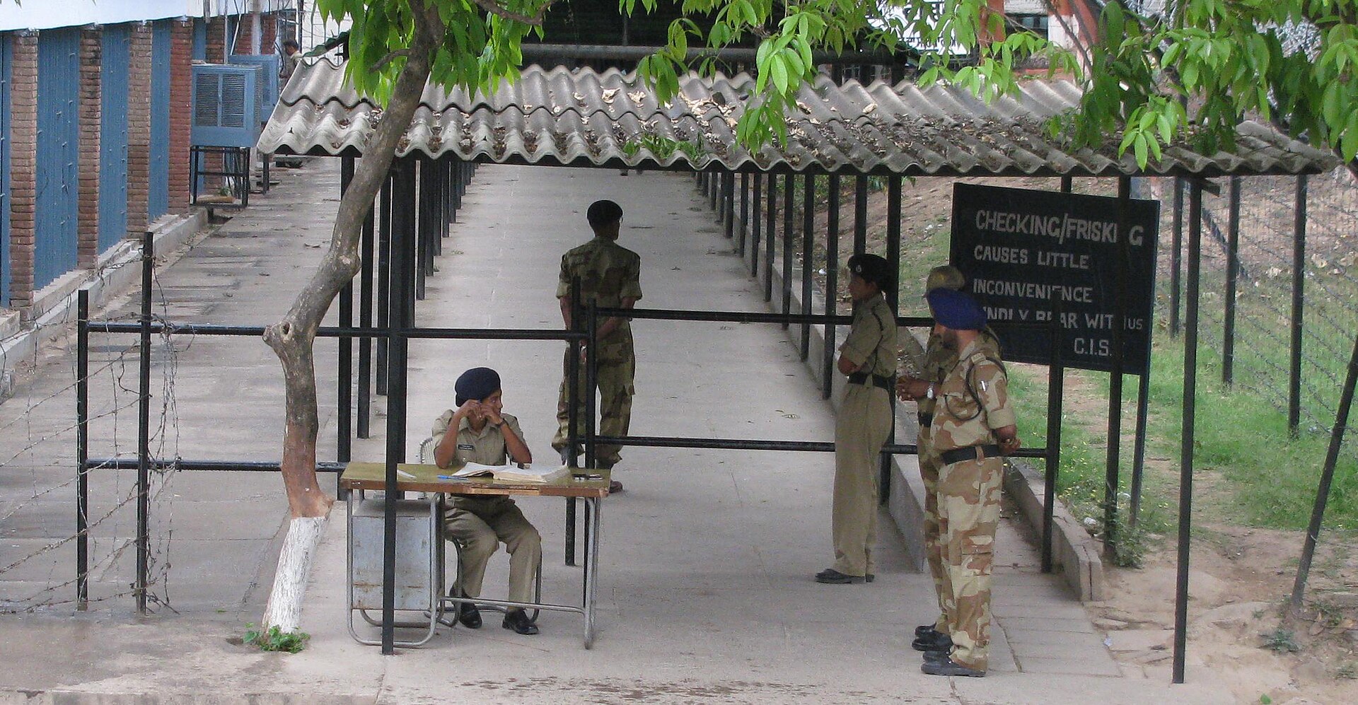 CISF security personnel at an Indian airport checkpoint
