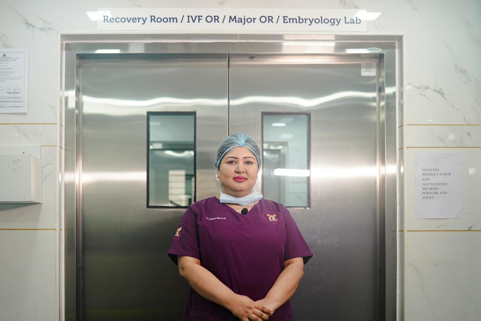 Indian medical professional in hospital corridor