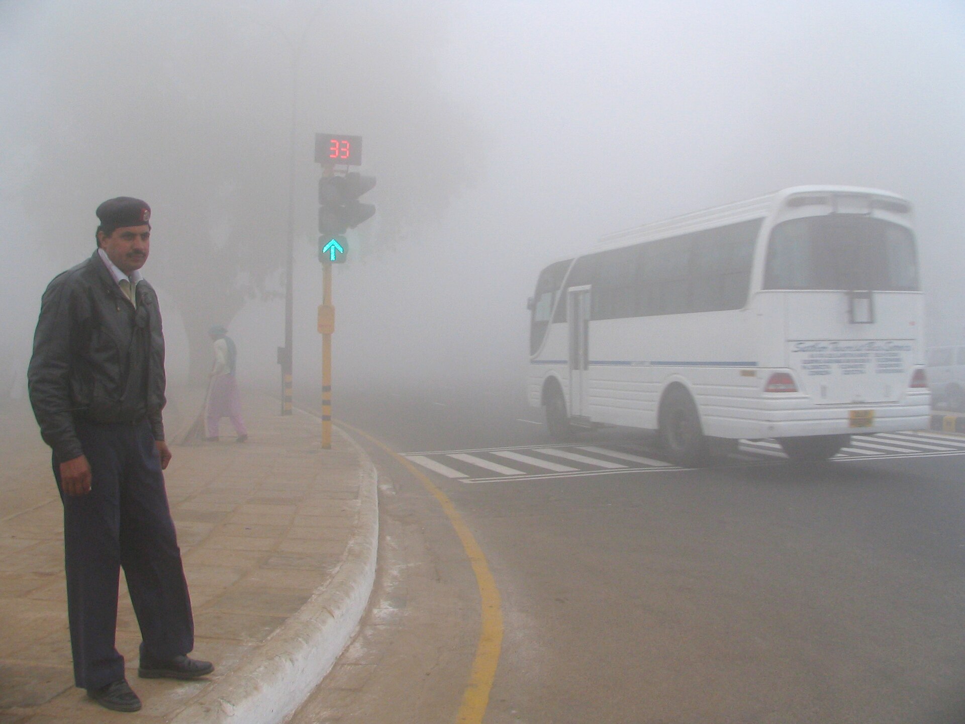 Delhi traffic police on duty in winter fog